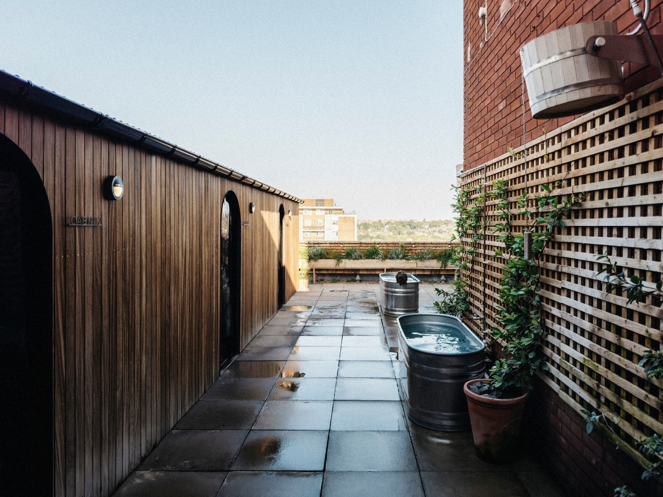 Private sauna cabins on a London rooftop, designed, built and run by Revill Design Group